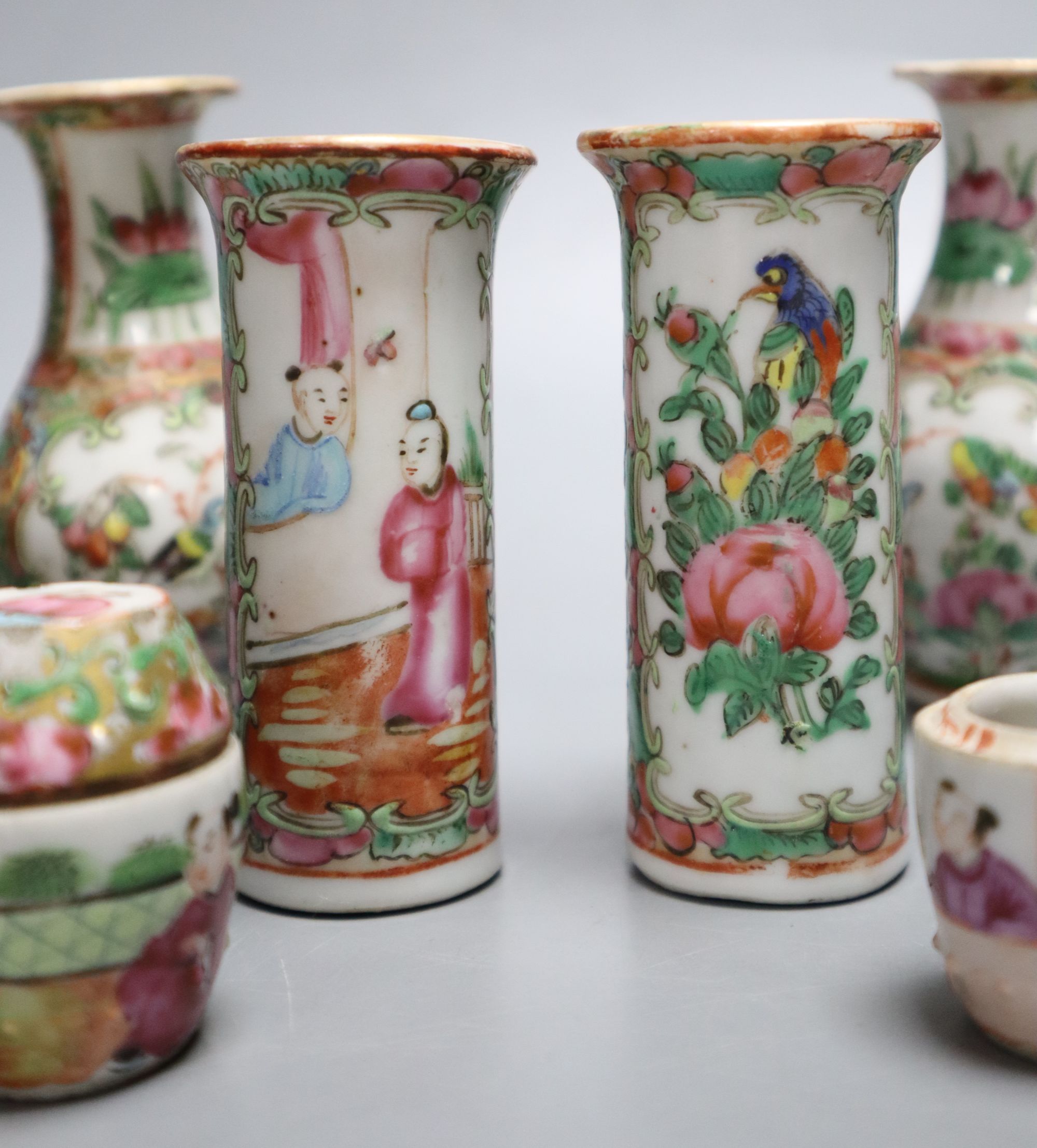 A group of Chinese famille rose tea wares and miniature vases, 19th century, tallest 9.5cm, damage